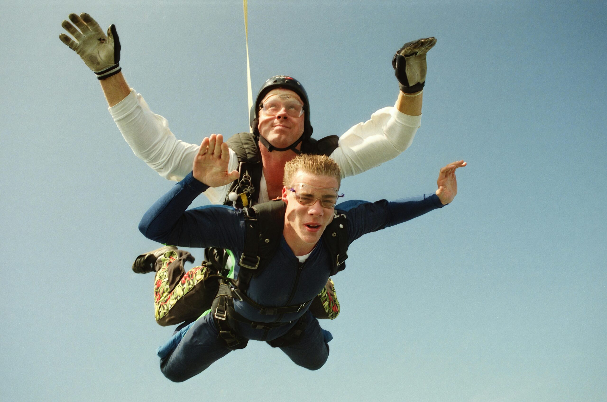 Exhilarating tandem skydiving experience in Baldwin, Wisconsin, captured in mid-air.