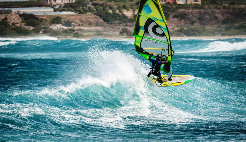 Experience the thrill of windsurfing on the stunning waves of Crete, Greece.