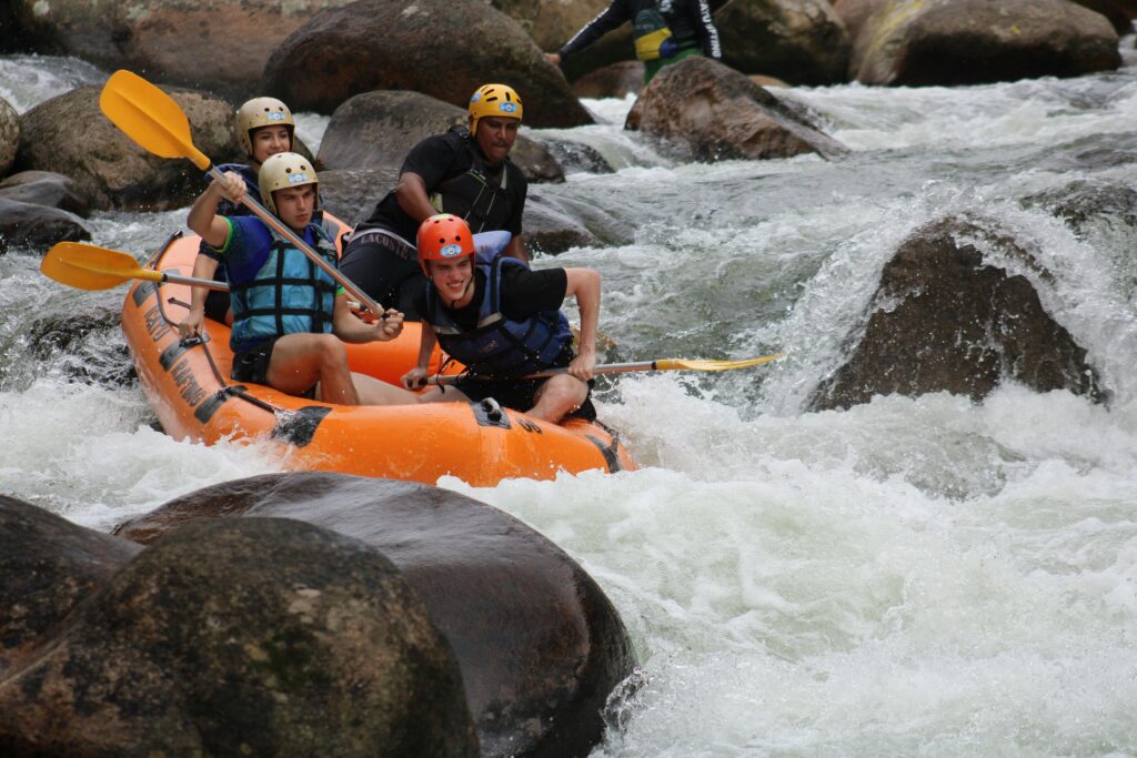 Thrilling white water rafting experience on a Brazilian river with a group of enthusiasts.